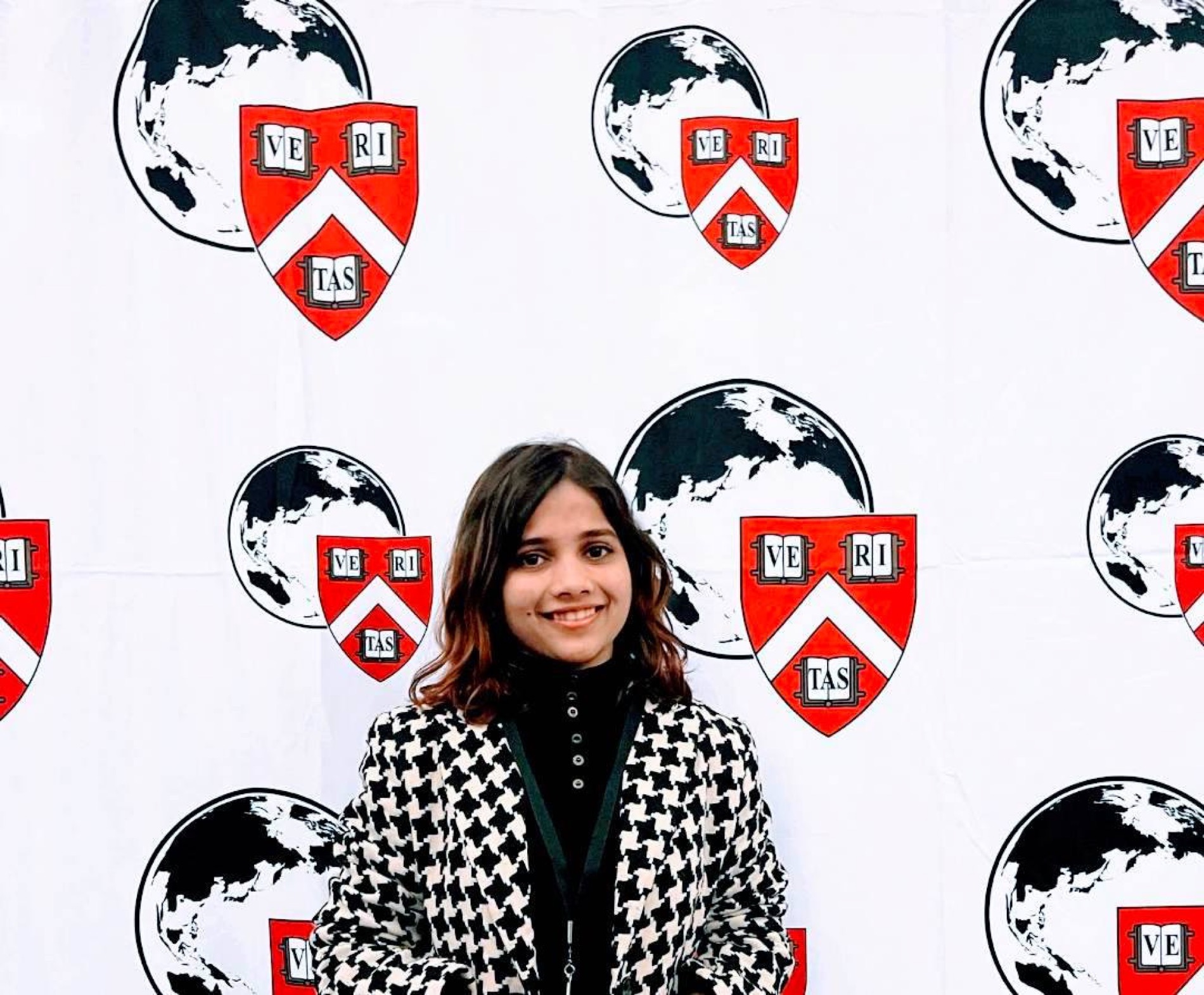 Sam smiling at a Harvard event