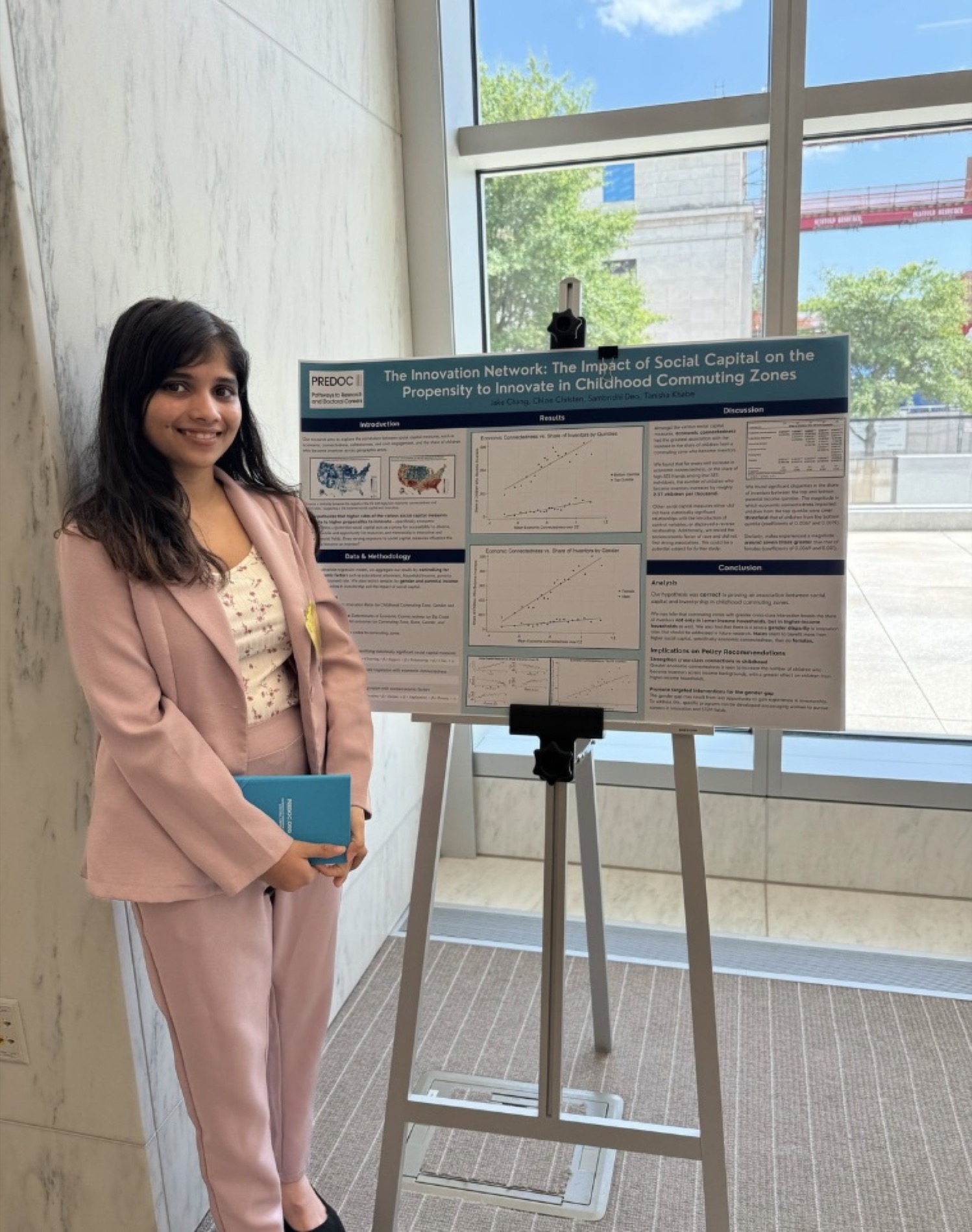 Sam presenting her research poster